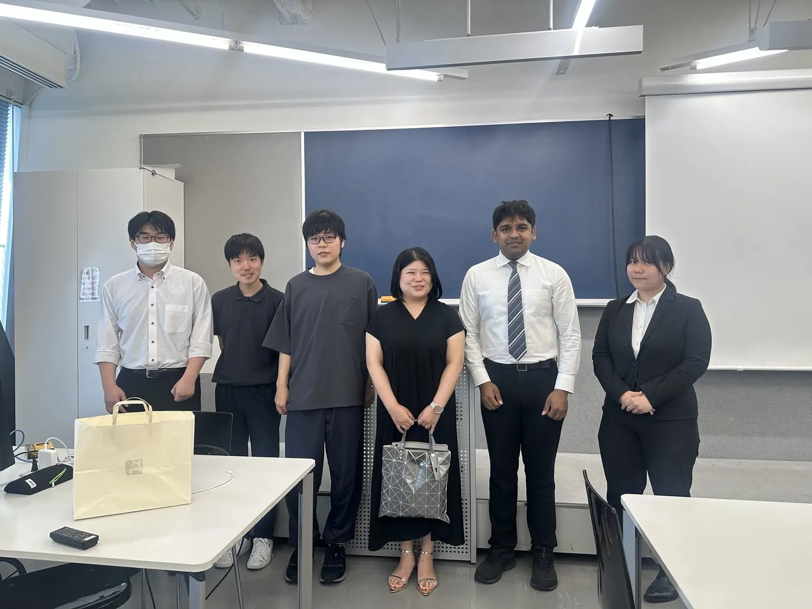 The Suma-Getsu team receiving the award at IPUT